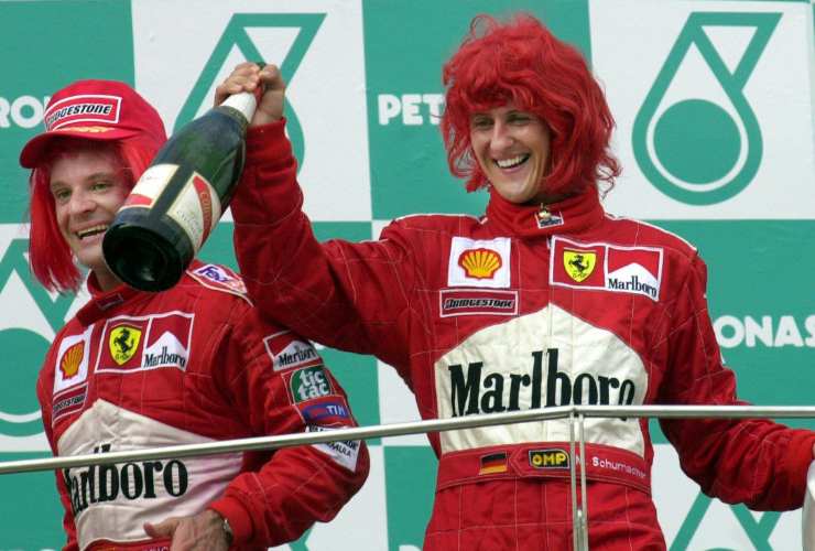 Barrichello e Schumacher sul podio